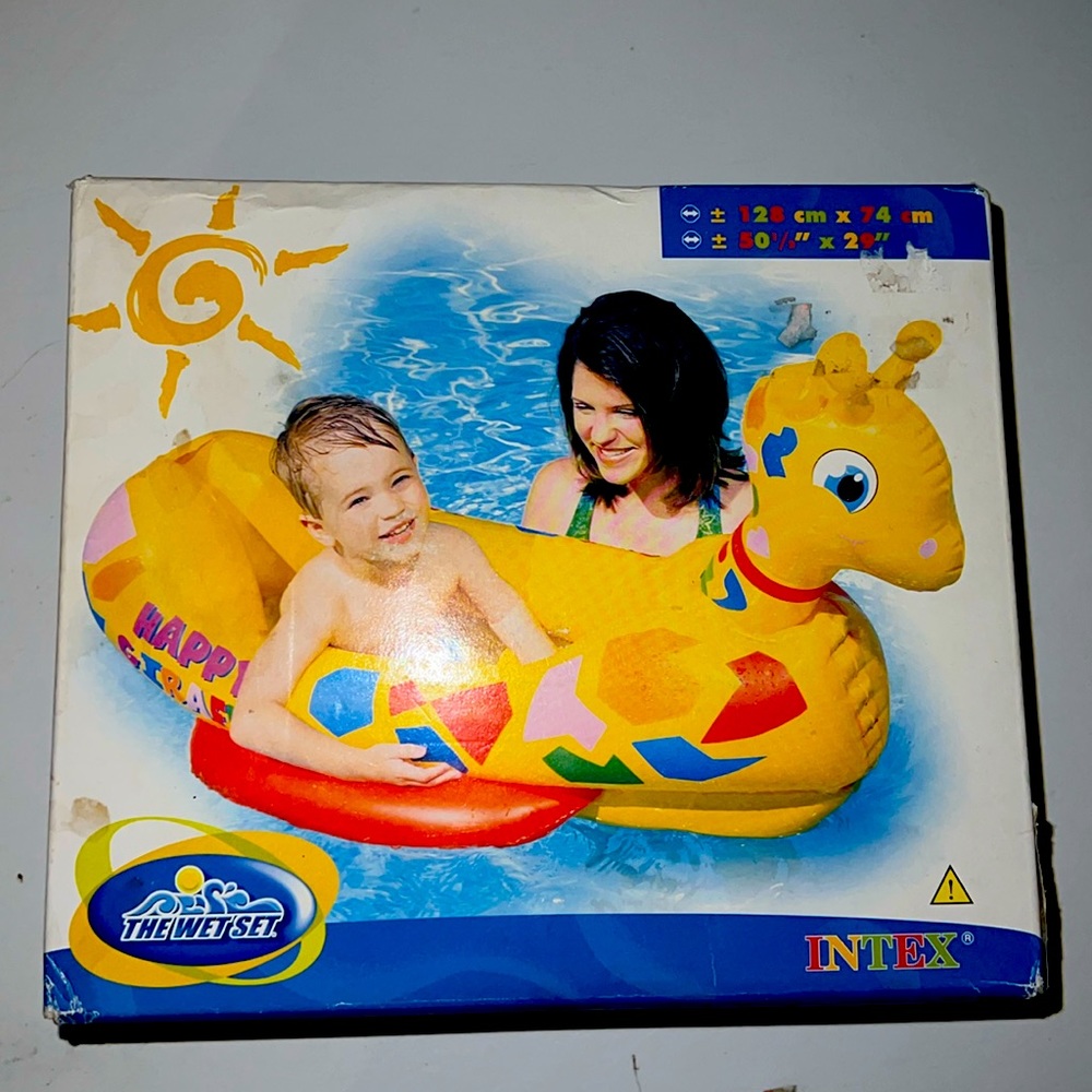 Vintage Kids floating giraffes boat